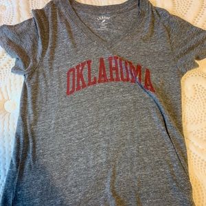 A vneck T-shirt that is perfect for wearing with leggings or dressing up w jeans